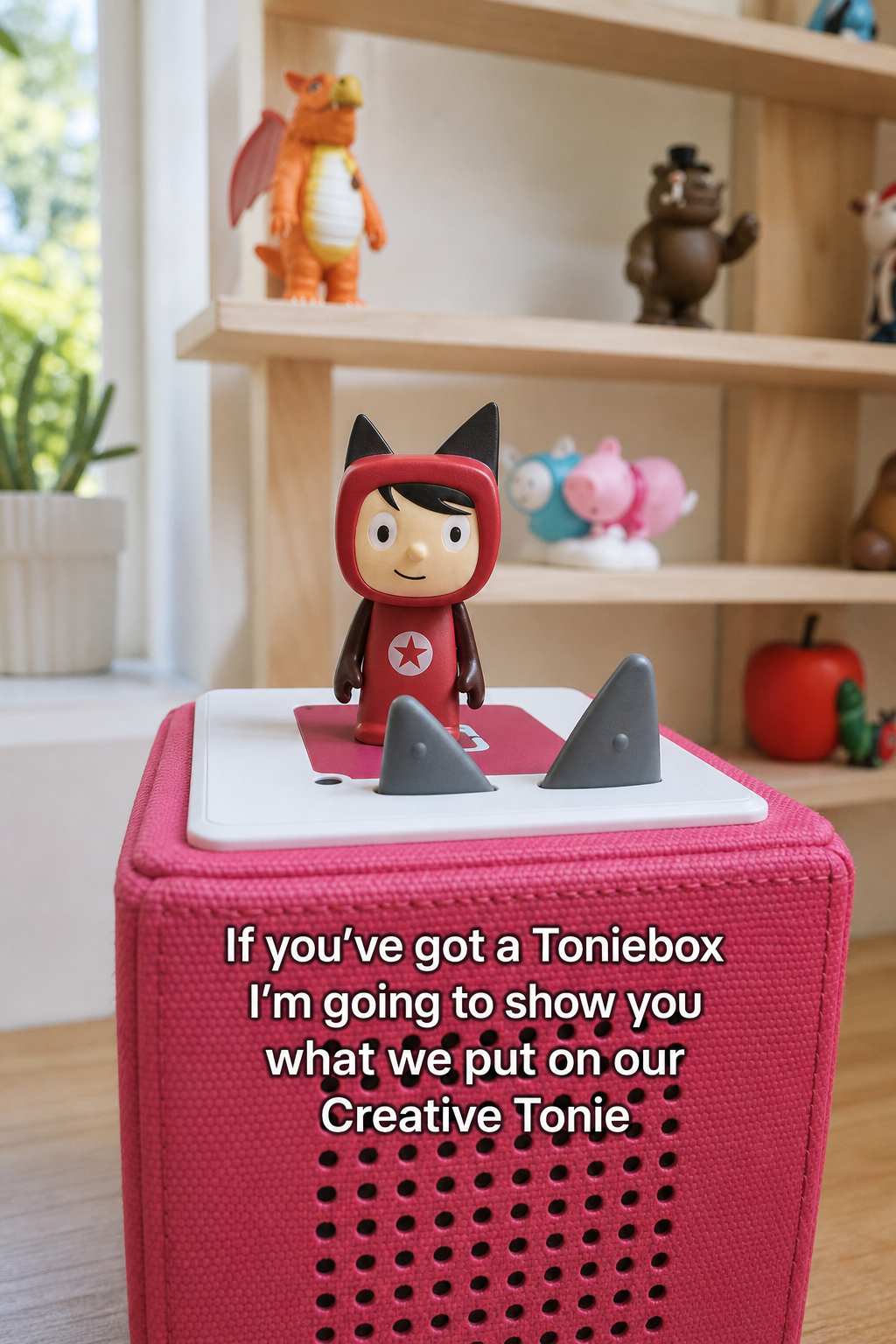 Pink Toniebox with a Creative Tonie on top. Text says if you've got a Toniebox I'm going to show you what we put on our Creative Tonie.